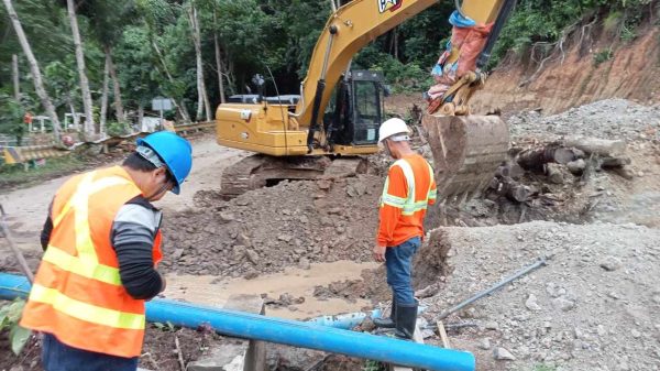 Personnel at Camiguin Water Company work to upgrade infrastructure and enhance water resilience in the Benoni area near Katunggan Park. (Photo courtesy of CWC)