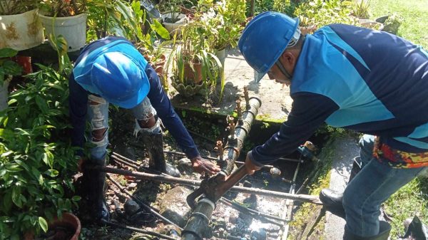 The technical team of Camiguin Water Company facilitated the meter replacement at Bura, Catarman, Camiguin. (Photo courtesy of CWC)